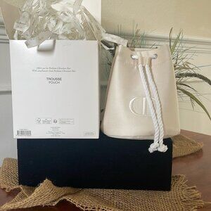 Dior Beige Beauty Drawstring embroidered bag.